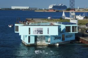 Danish students take to the seas in floating shipping container apartments